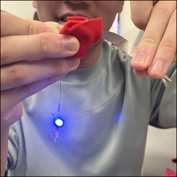 Testing my OSHA violation of a circuit, with a better-working fabric battery holder.